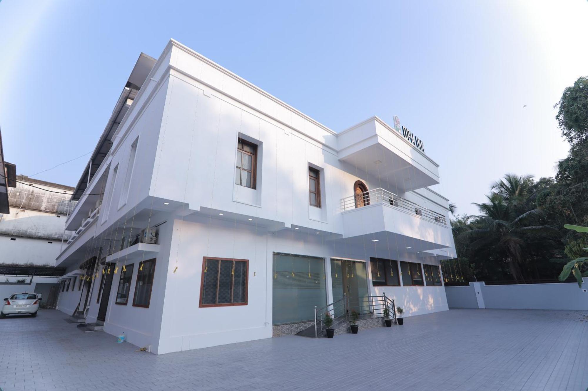 Opm Inn Payyannur Exterior photo