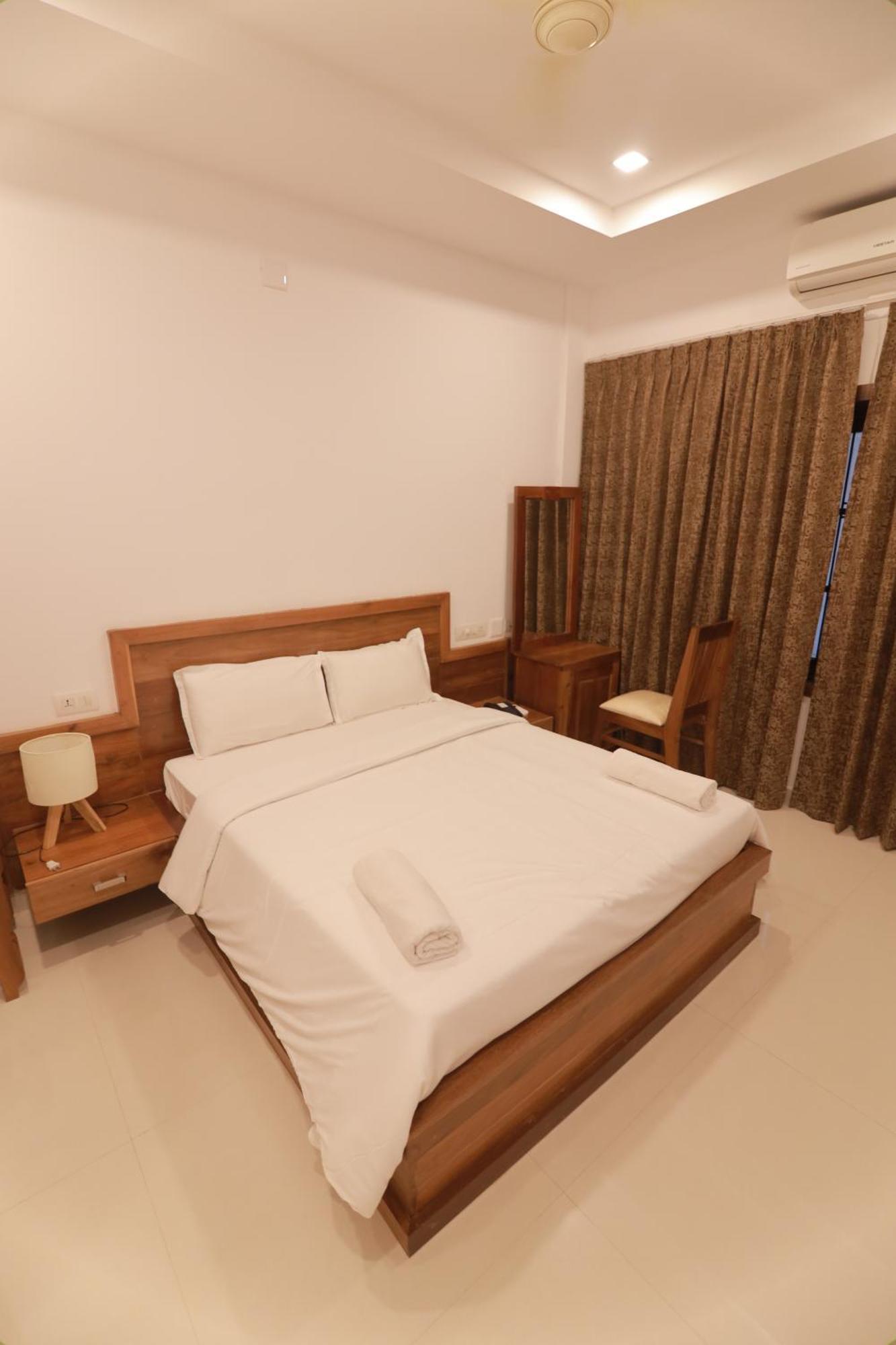 Opm Inn Payyannur Exterior photo