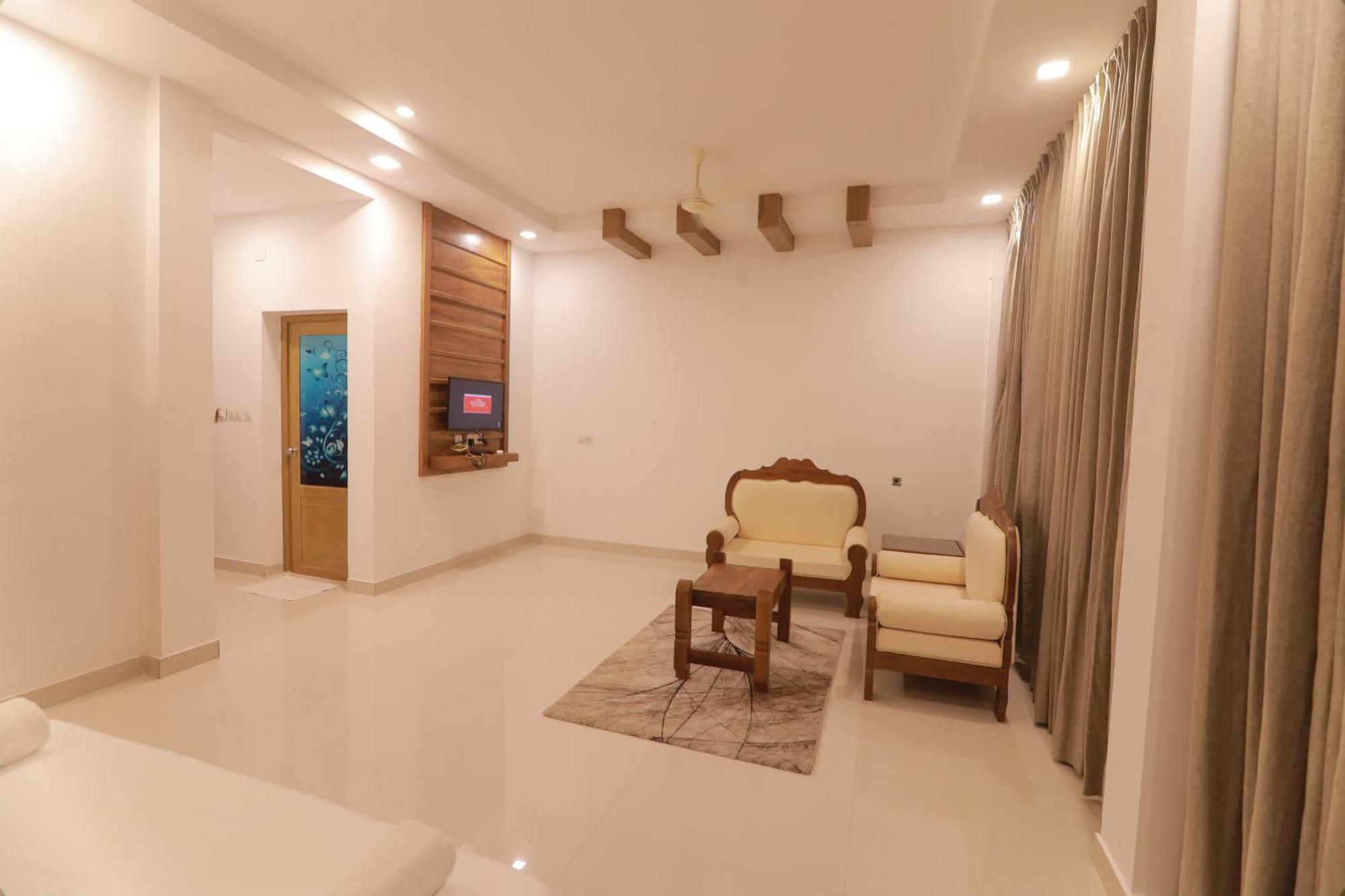 Opm Inn Payyannur Exterior photo